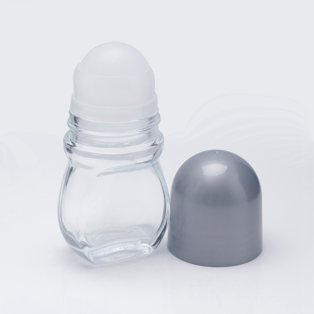 Factory Supply Cheap Wholesale Custom Label Eco-friendly Round Shape Essential Oil Antiperspirant Container Frosted Empty Refillable 50ml Clear Roll On Perfume Oil Bottle