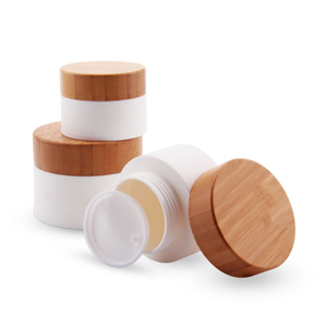 Trade assurance glossy luxury bamboo cosmetic packaging bamboo lids plastic jar with screw